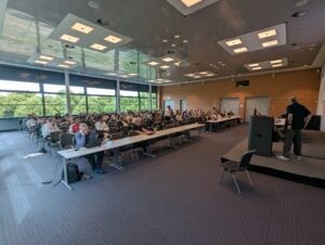 Over 100 attendees filling the room at the OpenHPC BoF session during ISC 2026
